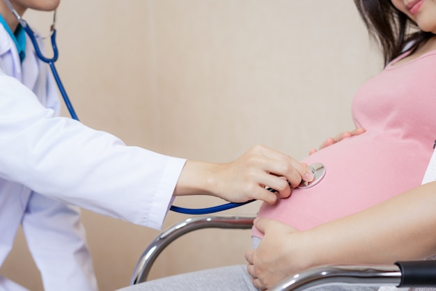 Pregnant Woman and Gynecologist Doctor at Hospital