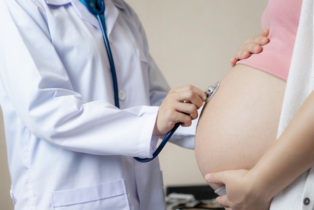 Pregnant Woman and Gynecologist Doctor at Hospital