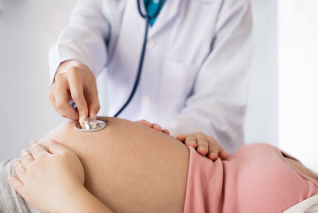 Pregnant Woman and Gynecologist Doctor at Hospital