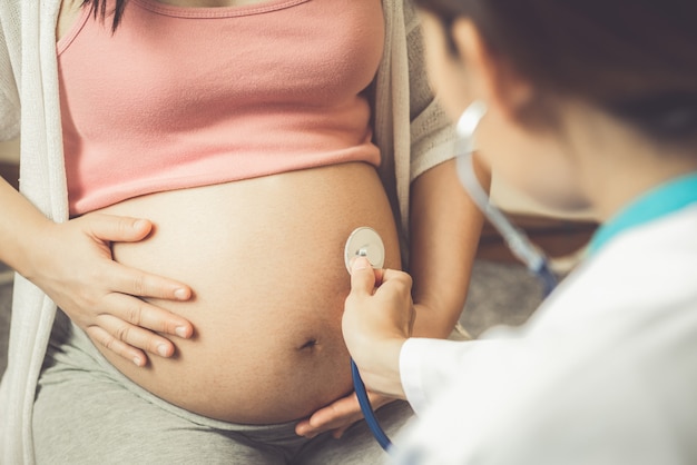 Pregnant Woman and Gynecologist Doctor at Hospital