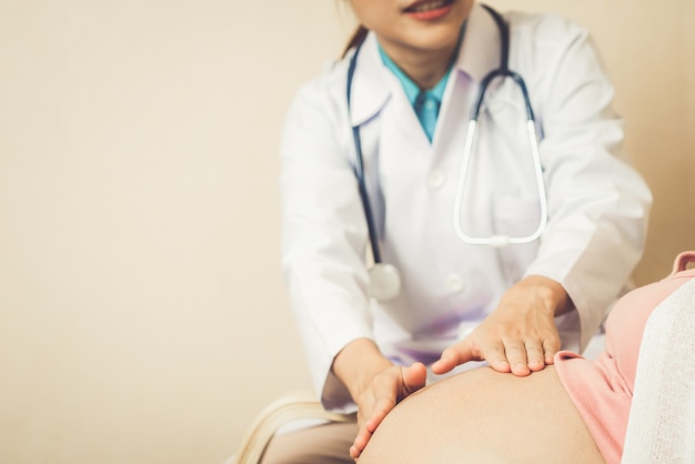 Pregnant Woman and Gynecologist Doctor at Hospital