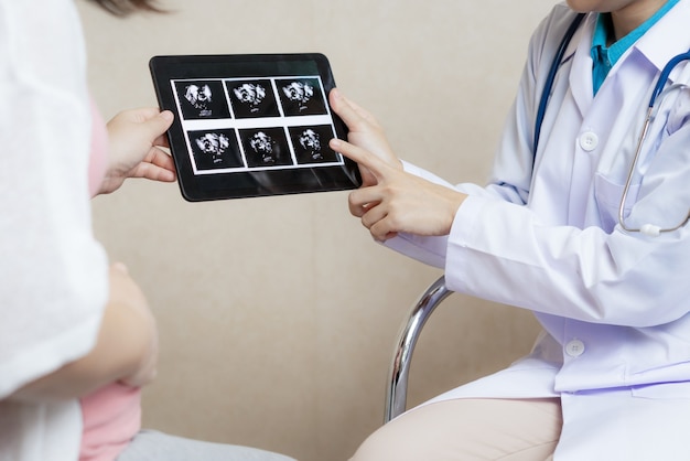 Pregnant Woman and Gynecologist Doctor at Hospital