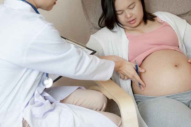 Pregnant Woman and Gynecologist Doctor at Hospital