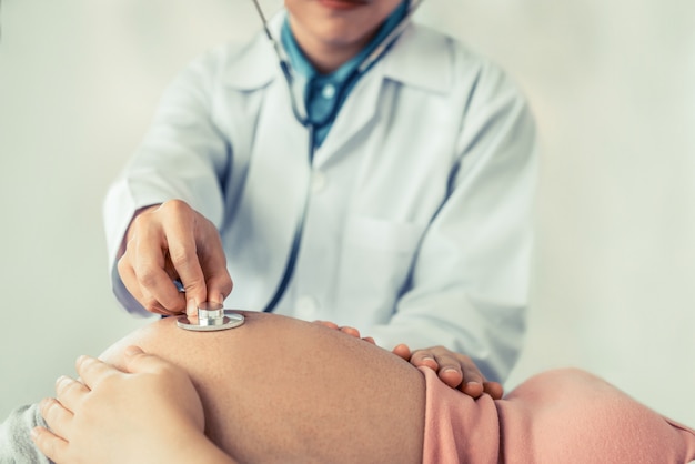 Pregnant Woman and Gynecologist Doctor at Hospital