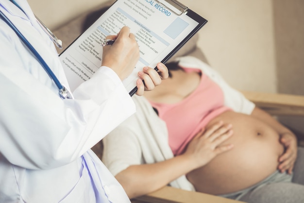 Pregnant Woman and Gynecologist Doctor at Hospital