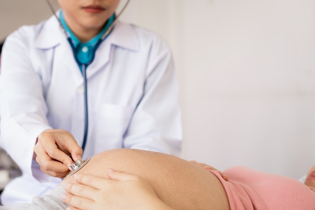 Pregnant Woman and Gynecologist Doctor at Hospital