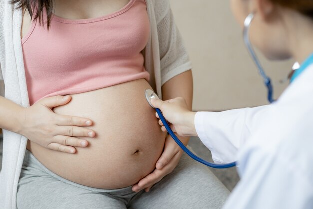 Pregnant Woman and Gynecologist Doctor at Hospital