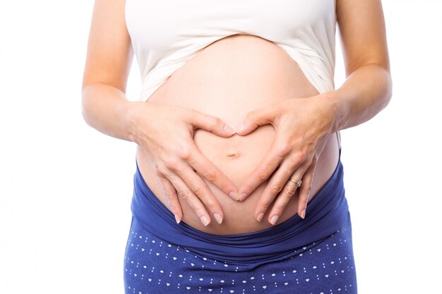 Pregnant woman holding her bump