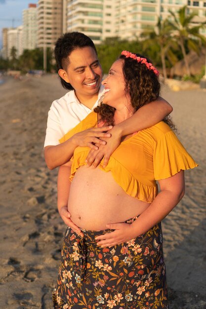 Pregnant Woman And Husband In Outdoor Scene