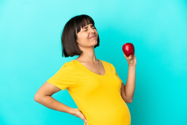 Pregnant woman over isolated background