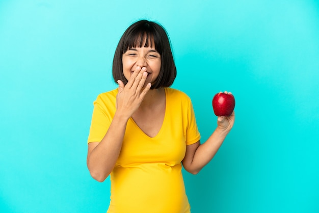 孤立した背景上の妊娠中の女性