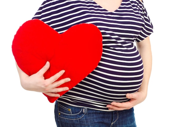 Pregnant woman isolated on a white background