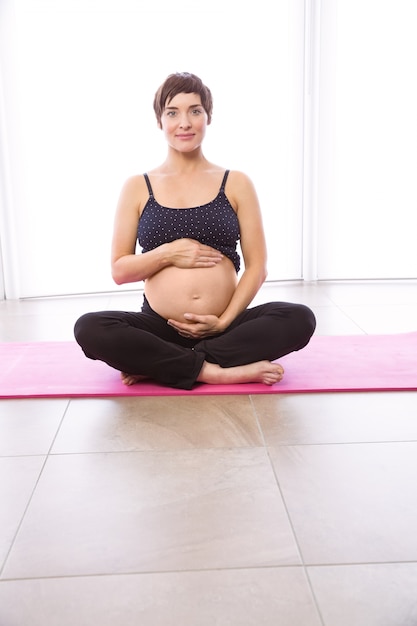 Pregnant woman keeping in shape