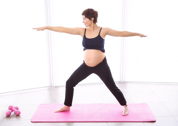 Pregnant woman keeping in shape