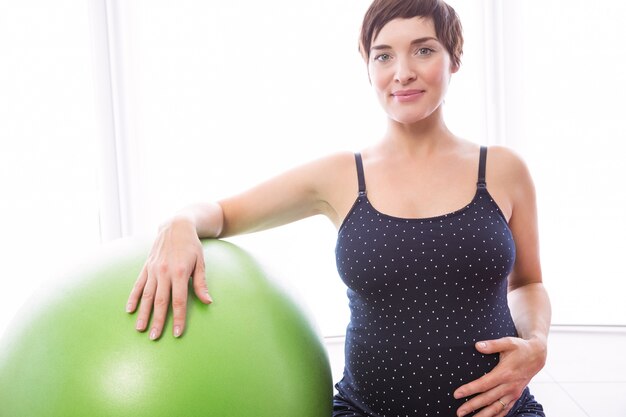 Pregnant woman keeping in shape