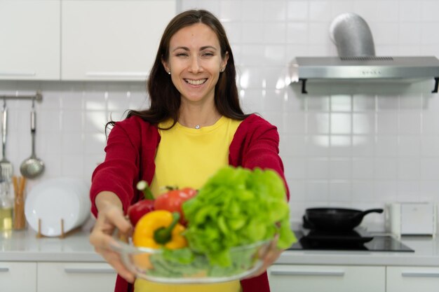 A pregnant woman in kitchen