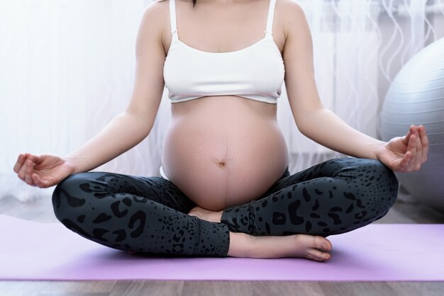 Pregnant woman in Lotus position