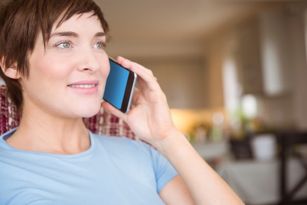 Pregnant woman making a call