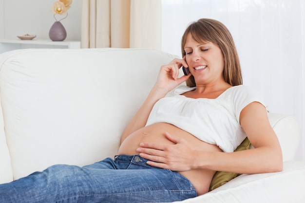 Pregnant woman phoning