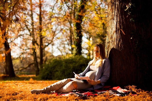 Pregnant woman reading book