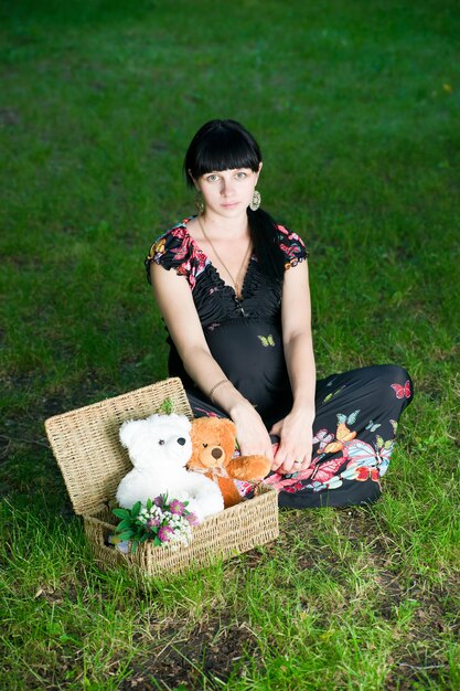 Pregnant woman relaxing on nature