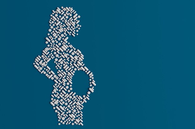 Pregnant woman silhouette made of pills