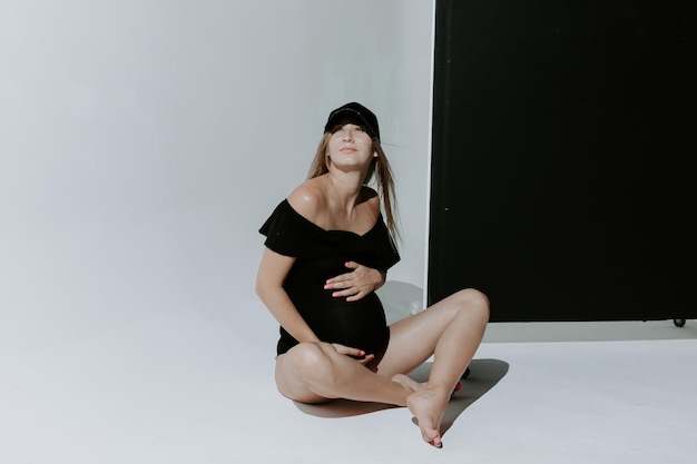 Pregnant woman. Studio shot