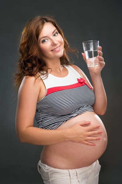 Pregnant woman in the studio