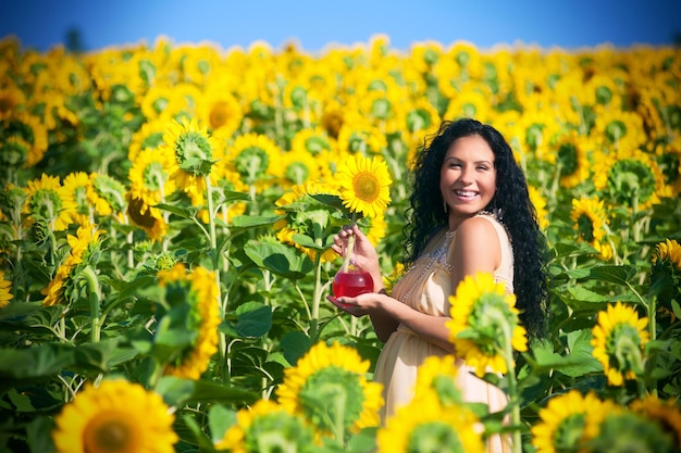 Pregnant woman in sunflowers