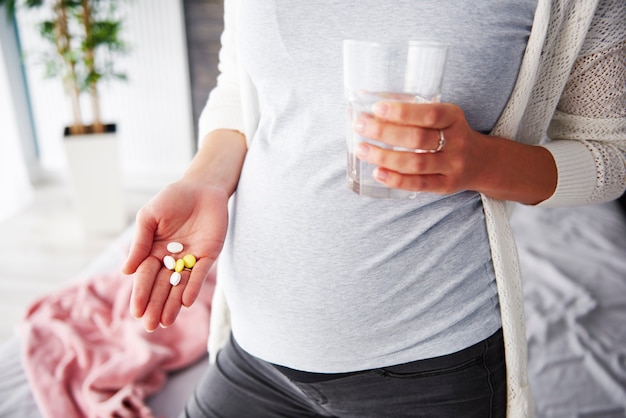 Pregnant woman taking medicines