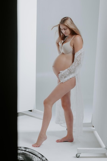 Premium Photo  Pregnant woman in underwear. studio shot