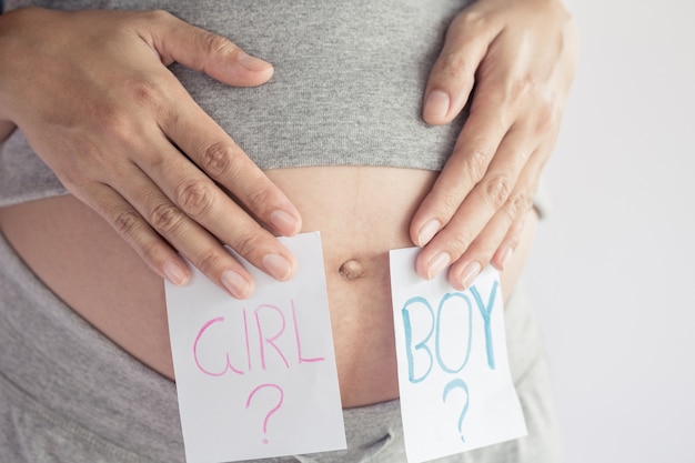 pregnant woman waiting for a boy or girl