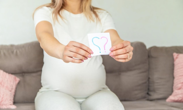 Pregnant woman who will be the question mark Selective focus