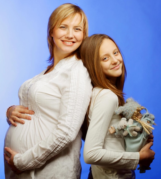 Pregnant woman with daughter