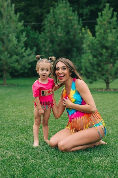 pregnant woman with her daughter