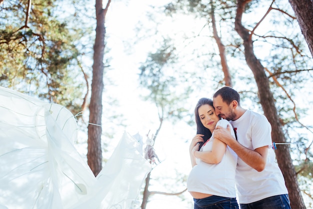 Pregnant woman with her husband waiting for  newborn baby.