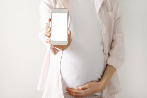 Pregnant woman with mobile