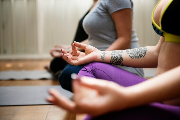Photo pregnant woman in yoga class