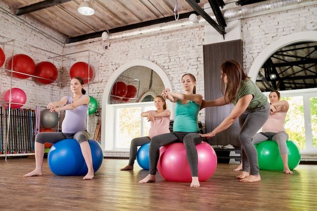 Pregnant Women doing Fitness Exercises