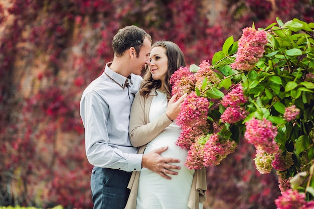 A pregnant young woman and her husband.