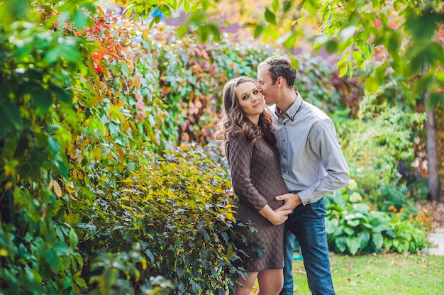 A pregnant young woman and her husband.