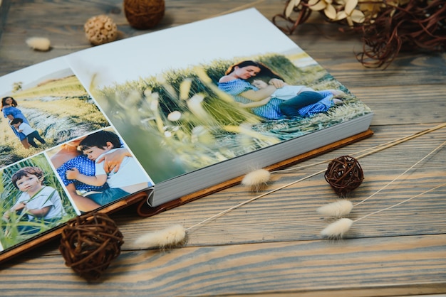 Premium photo book, large size, natural wood cover, quality binding. Family photobook, recreation memories