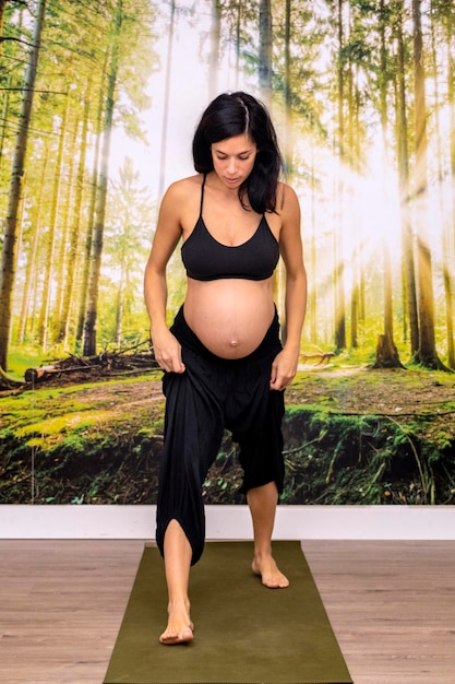 Prenatal Yoga Yoga instructor performing healthy exercises for your baby