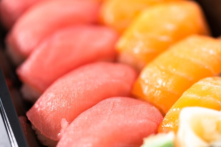 Photo プラスチック製のトレイにあらかじめパッケージ化された寿司