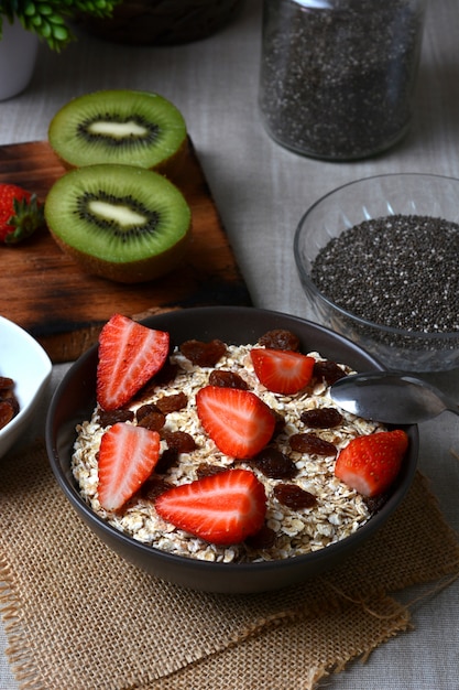 Preparation of breakfast with flakes of oats