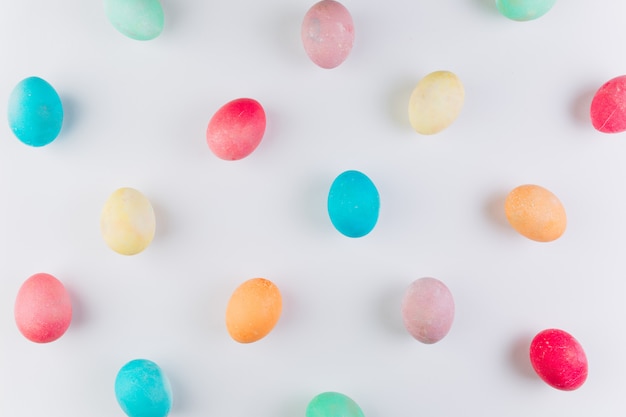 Preparation for Easter. Сolored eggs on a blue background