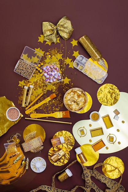 Preparation for the holiday party in golden tones Decor means and tools of gold color Gold party decoration