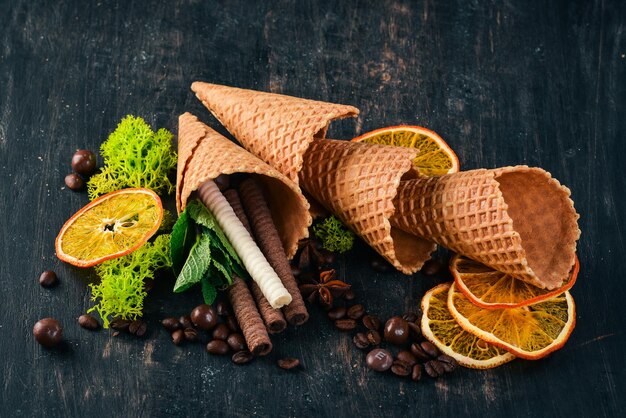 Preparation for ice cream On a black wooden background Copy space