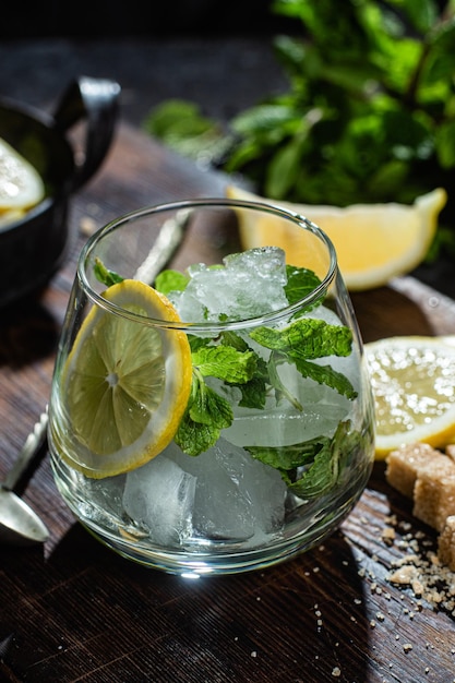 Preparation of lemonade with mint and lemon. Ice cocktail