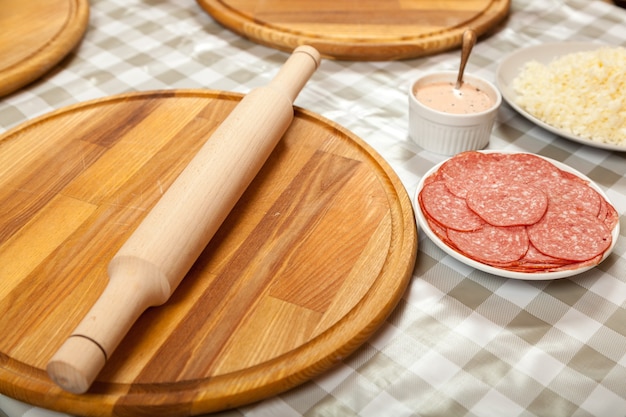 Preparation for a master class on cooking pizza in the kitchen in a cafe